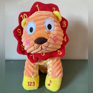 Baby Happi by Dena; plush toy, educational, Lion. Push for music, ABCs. Rattle.